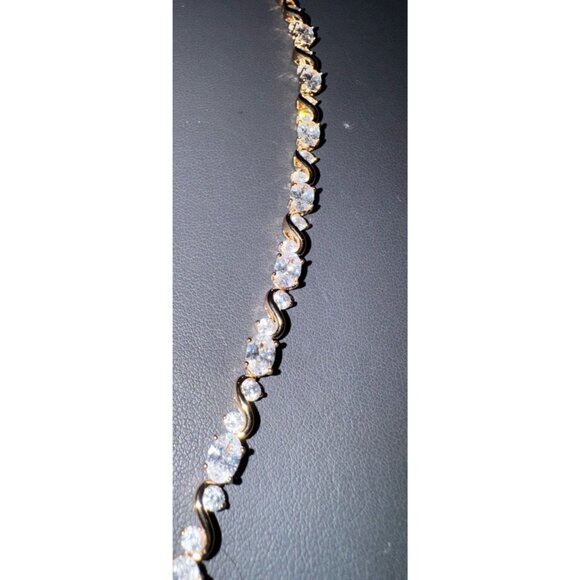 Gold Tone XP Tennis Bracelet 6.5” Sparkly Round CZ Stones Infinity Link - Picture 1 of 6